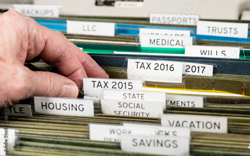 Home filing system for taxes organized in folders