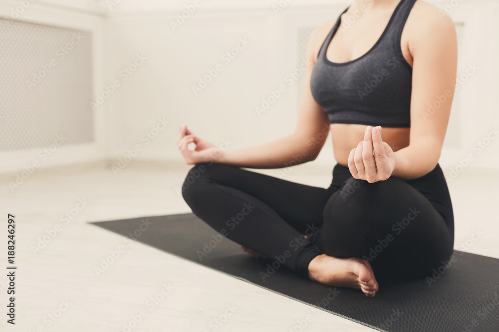 Fototapeta premium Young woman in yoga class, relax meditation pose