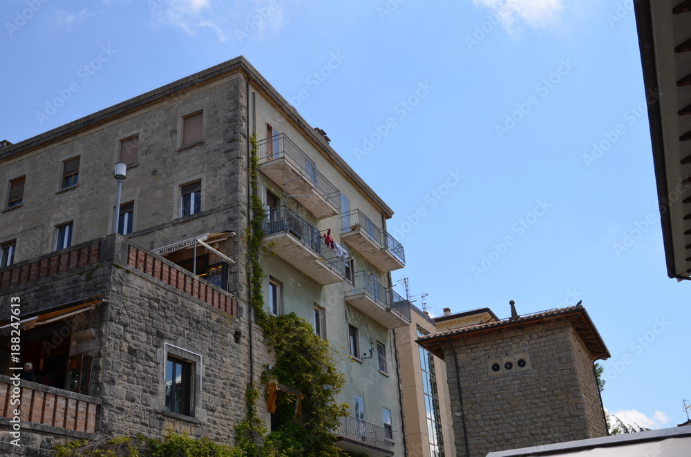 house, architecture, building, street, italy, village, stone, city, europe, town, medieval, houses, window, travel, urban, facade, roof, tourism, ancient, sky, balcony, view, wall, italian, buildings
