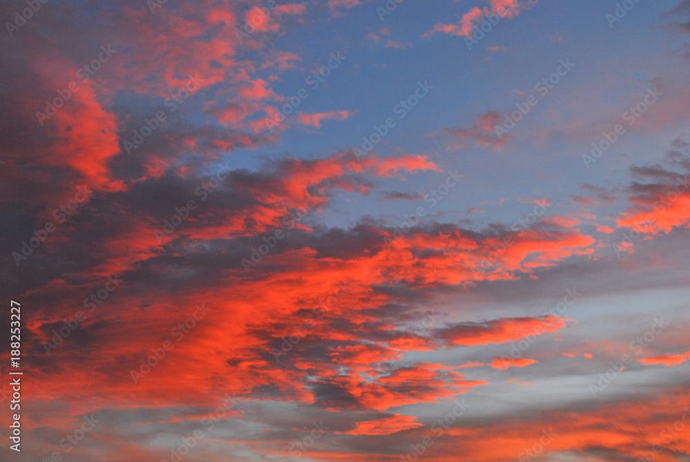 Ominous Sunrise of Orange Fire in a Blue Sky