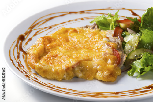 Baked meat with salad