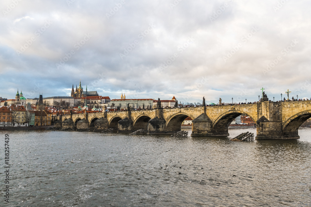 Fototapeta premium Winter sky over the Charles bridge in Prague