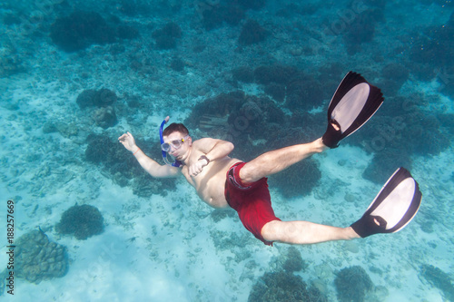 A man snorkeling in Andaman Sea, Thailand