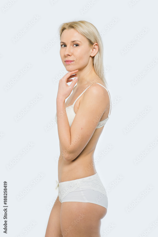 Snap Blonde Woman in white underwear Photos | Adobe Stock