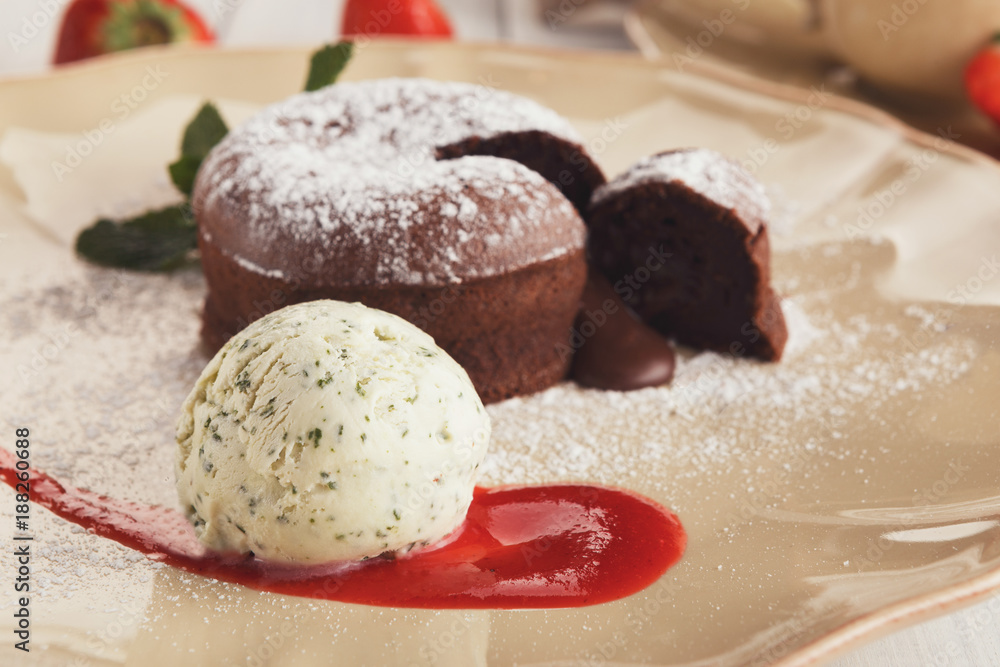 Chocolate fondant with vanilla ice cream and strawberry Chocolate fondant with vanilla ice cream and strawberry
