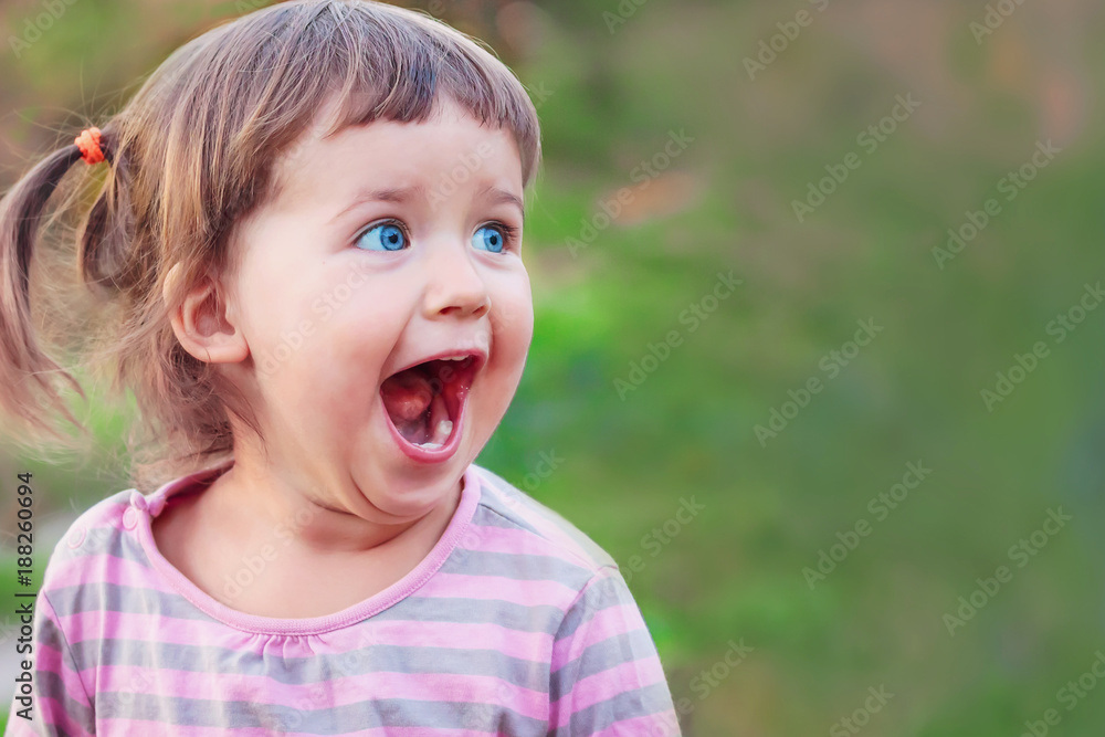 Little girl is surprised and happy Little girl is surprised and happy