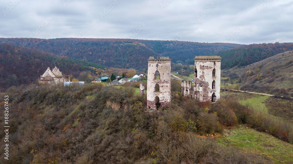 Aerial view on destroyed towers of the castle on the hill Aerial view on destroyed towers of the castle on the hill