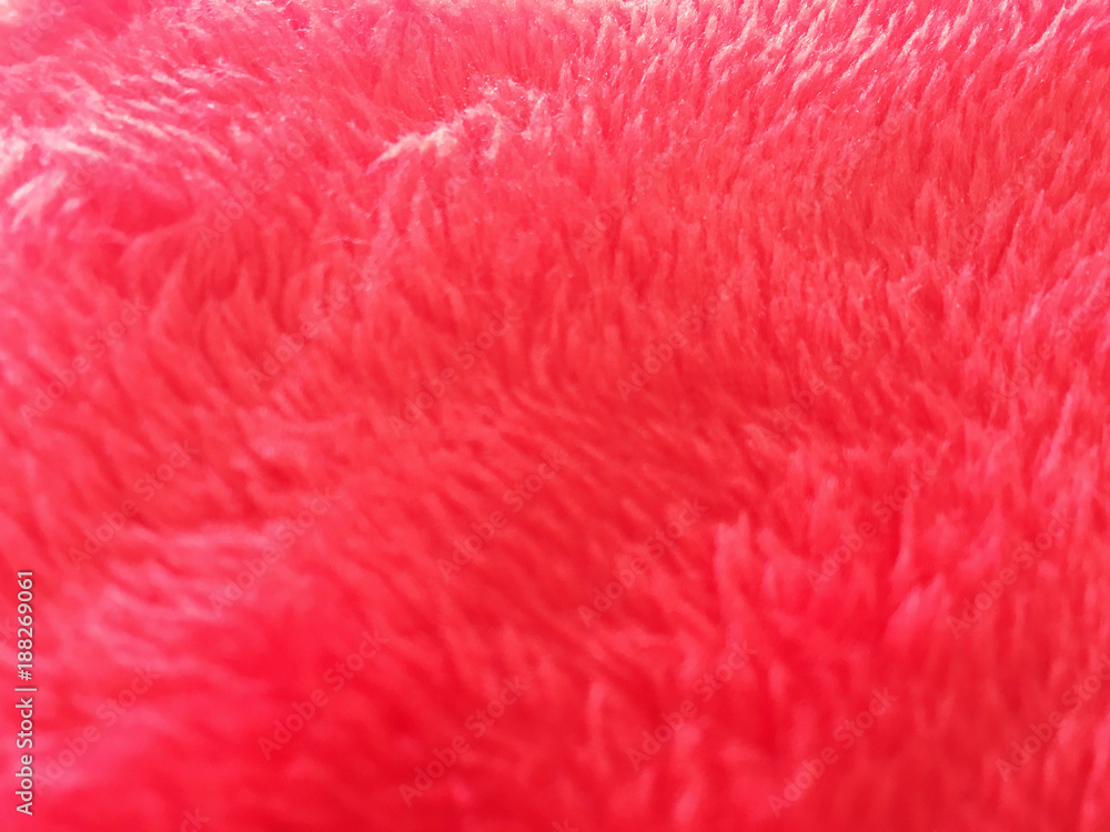 Fototapeta premium Soft red rug with short nap close-up, background