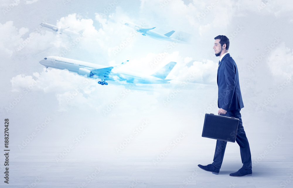 Obraz premium Businessman going somewhere with airplane
