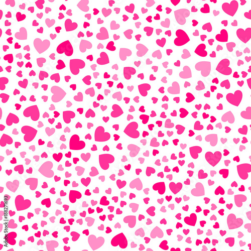 Cute little hearts in seamless pattern. Small heart shapes in different sizes and colors for Valentines Day background. Vector illustration. Bright pink hearts. Vector seamless pattern. Hearts mosaic.