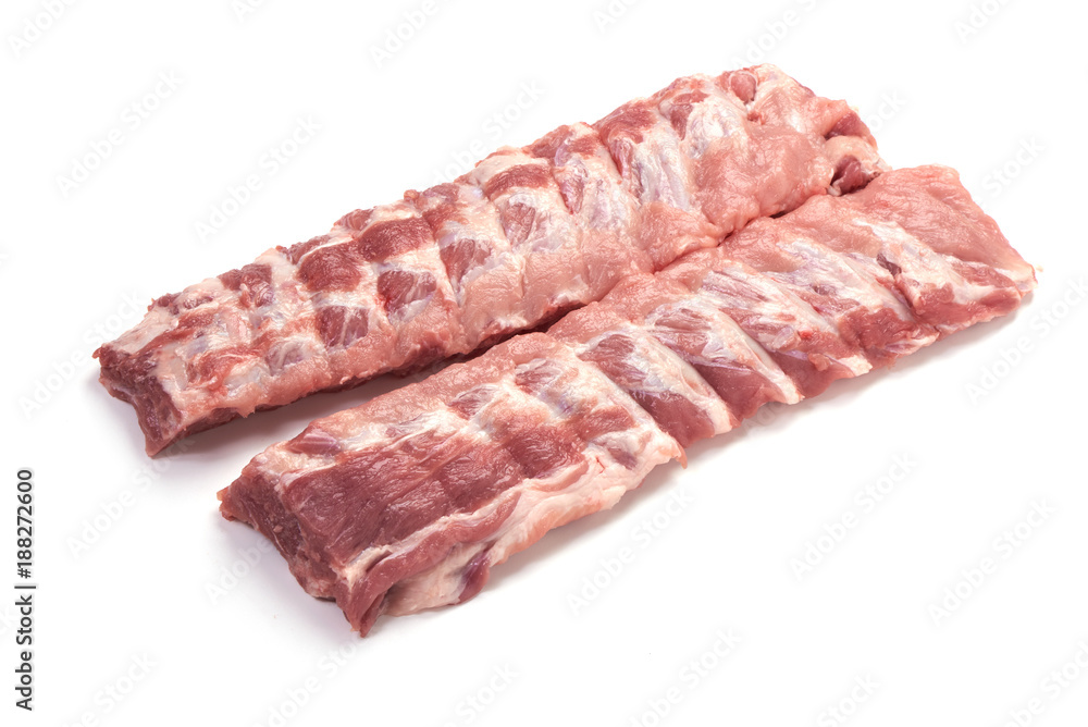 Fresh raw pork loin with ribs, close-up, isolated on white background.