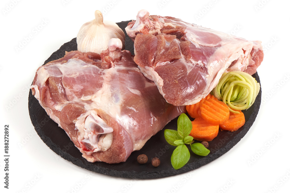 Raw turkey meat on stone plate, isolated on white background. Raw turkey meat on stone plate, isolated on white background.