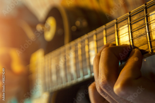 Photography Male hands are playing electric guitar