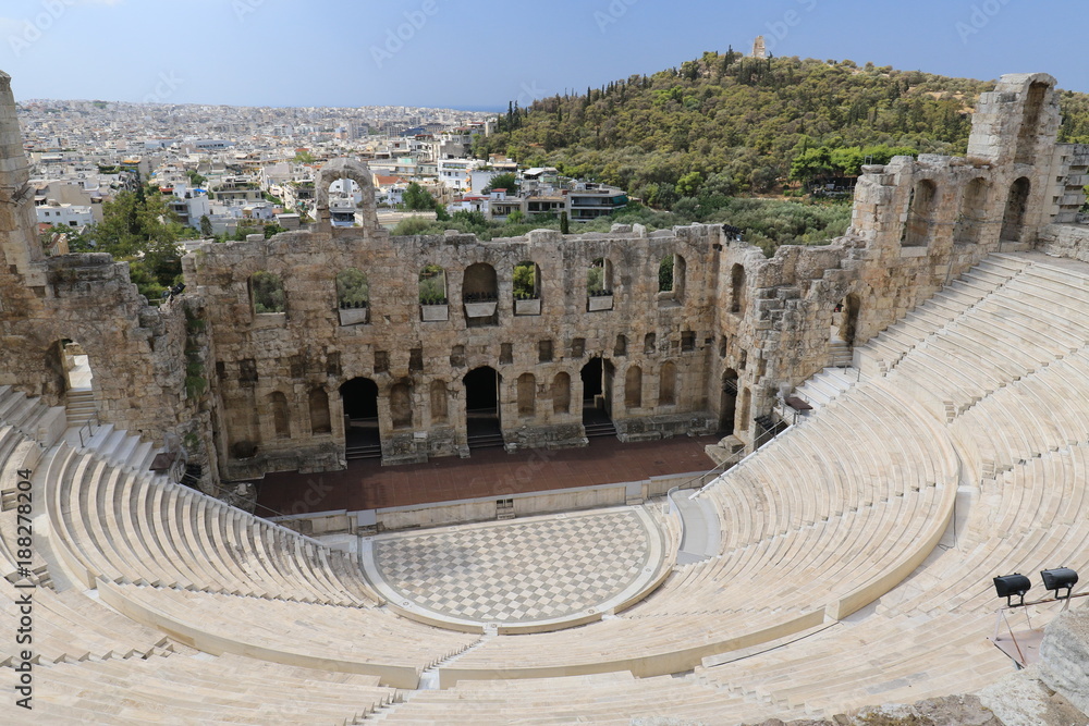 theater under acropolis, athens, greece on a sunny day
