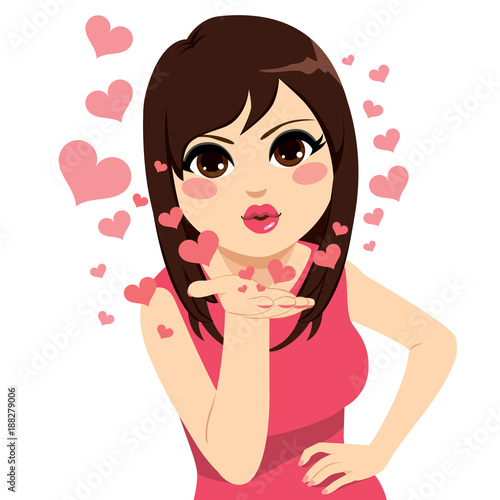 Beautiful young brunette woman sending kiss and hearts celebrating Saint Valentine day