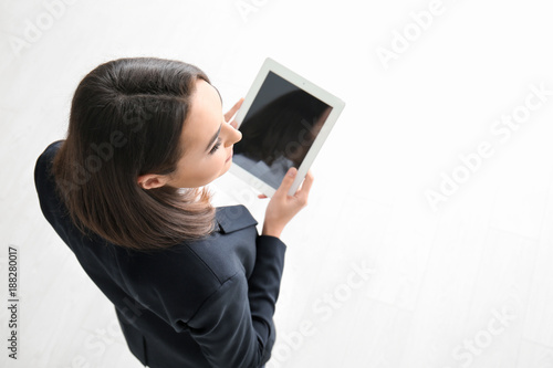 Young lawyer with tablet co...