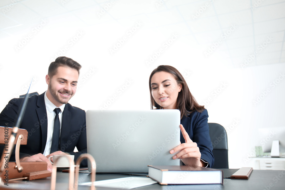 Young team of lawyers at workplace Young team of lawyers at workplace