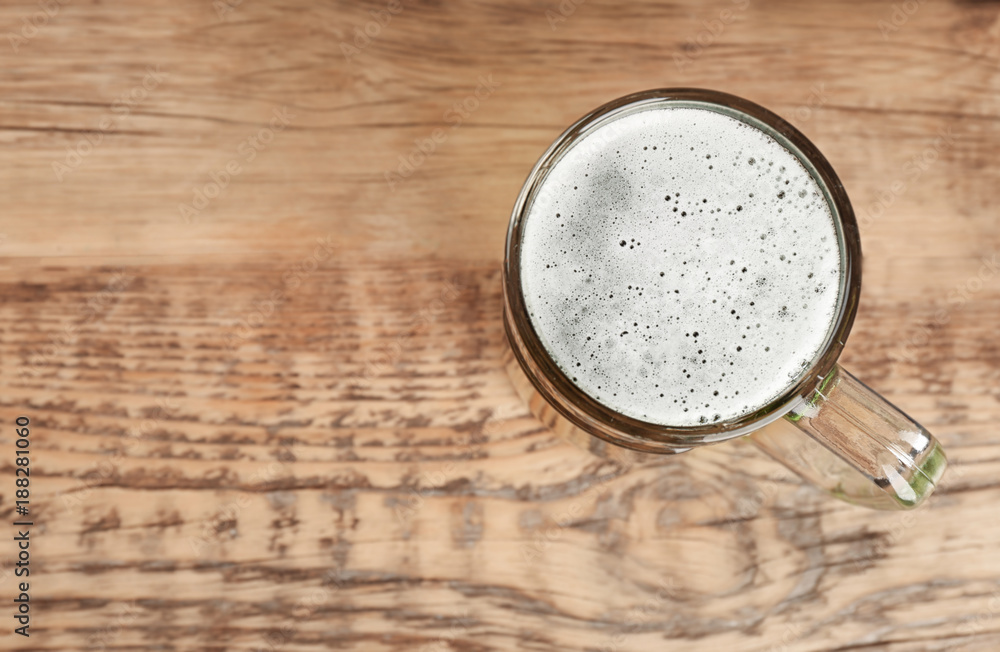 Glass of green beer on wooden background. Saint Patrick's day celebration Glass of green beer on wooden background. Saint Patrick's day celebration