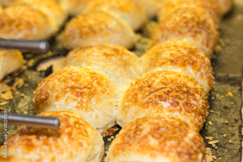 baking pastries and bread in an oven at a bakery photo