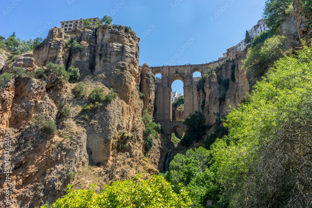 Fototapeta premium A gorge in the city of Ronda Spain, Europe on a hot summer day
