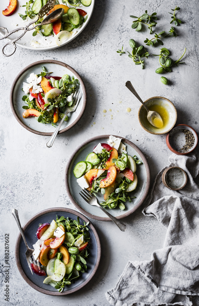 Cucamelons, peaches, cucumber, ricotta cheese and purslane salad. Cucamelons, peaches, cucumber, ricotta cheese and purslane salad.