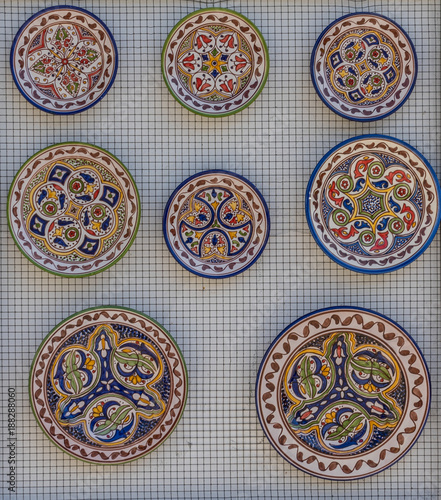 China decorations on a plate on a wall in the city of Ronda Spain  Europe on a hot summer day with clear blue skies