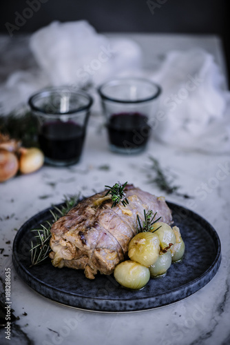 Iberian traditional roast pork, cooked with stuffed cheese and quince. photo