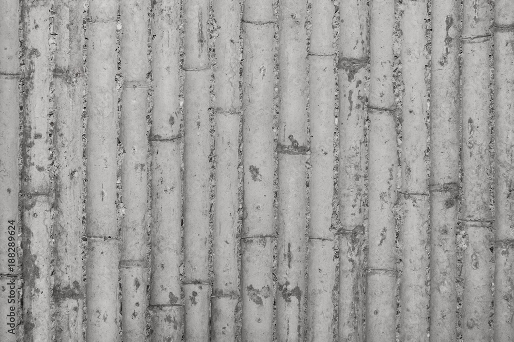 Obraz premium Modern concrete structure wall, Bamboo formwork imprinted on concrete wall, Modern original wall, Contemporary background concrete, Unique modern bamboo concrete background