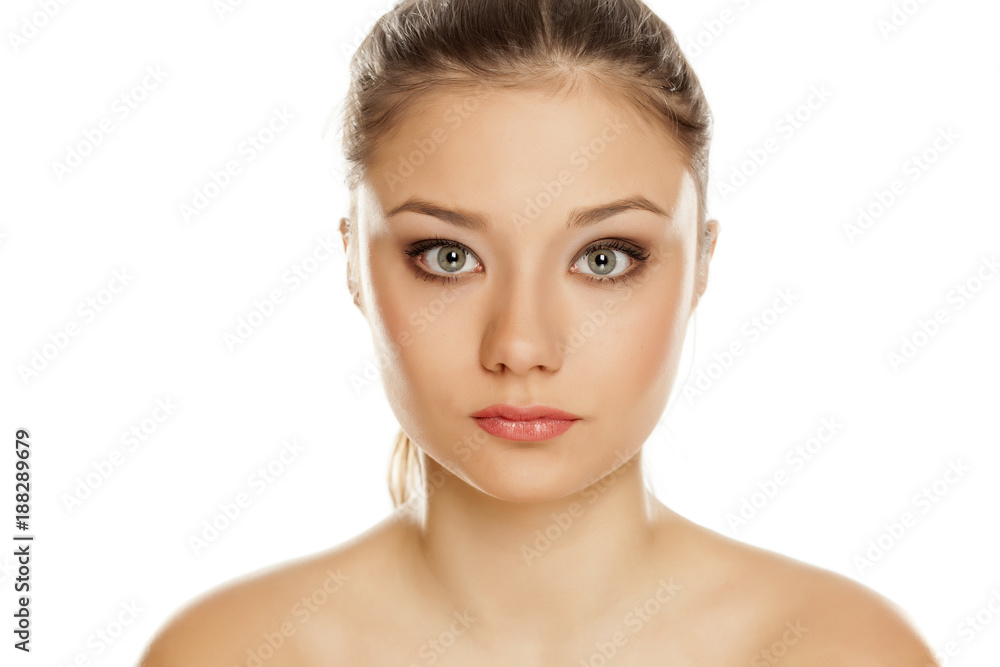 portrait of young girl with makeup on white background portrait of young girl with makeup on white background