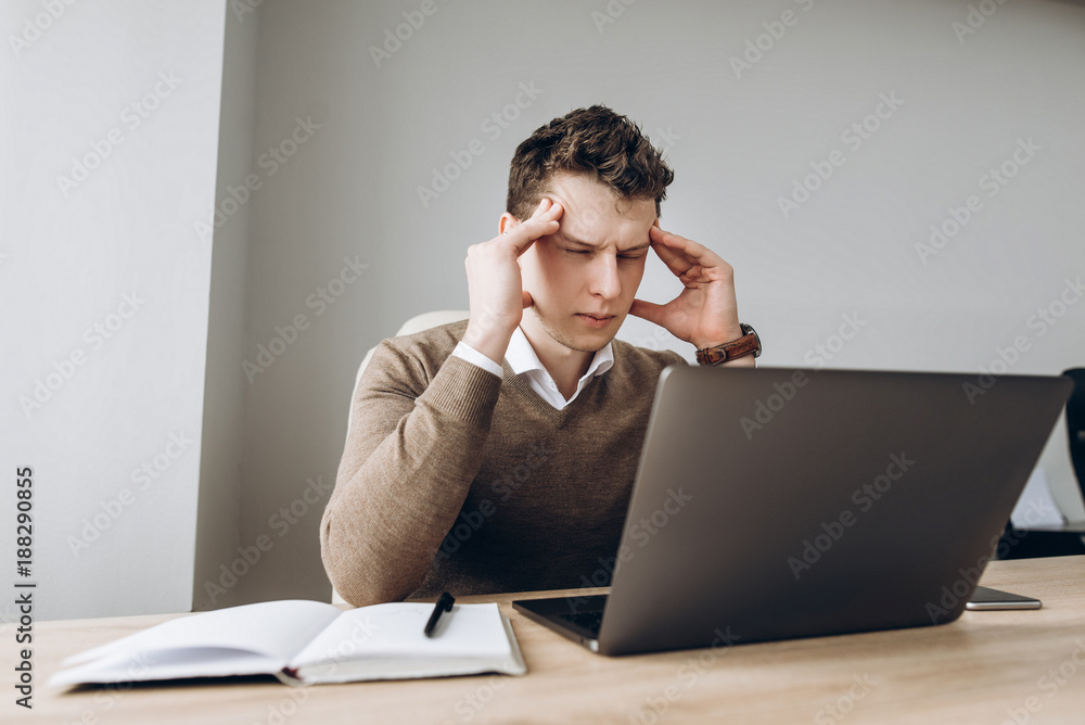 Portrait of a concentrated businessman who thinks over a new business ideas in his office Portrait of a concentrated businessman who thinks over a new business ideas in his office