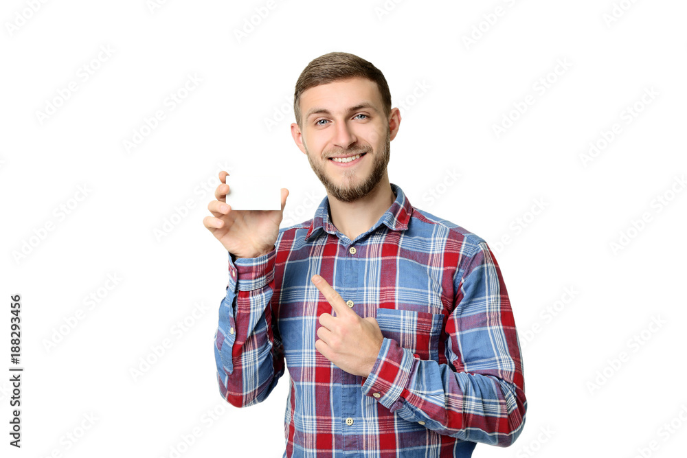Young man holding blank business card on white background Young man holding blank business card on white background