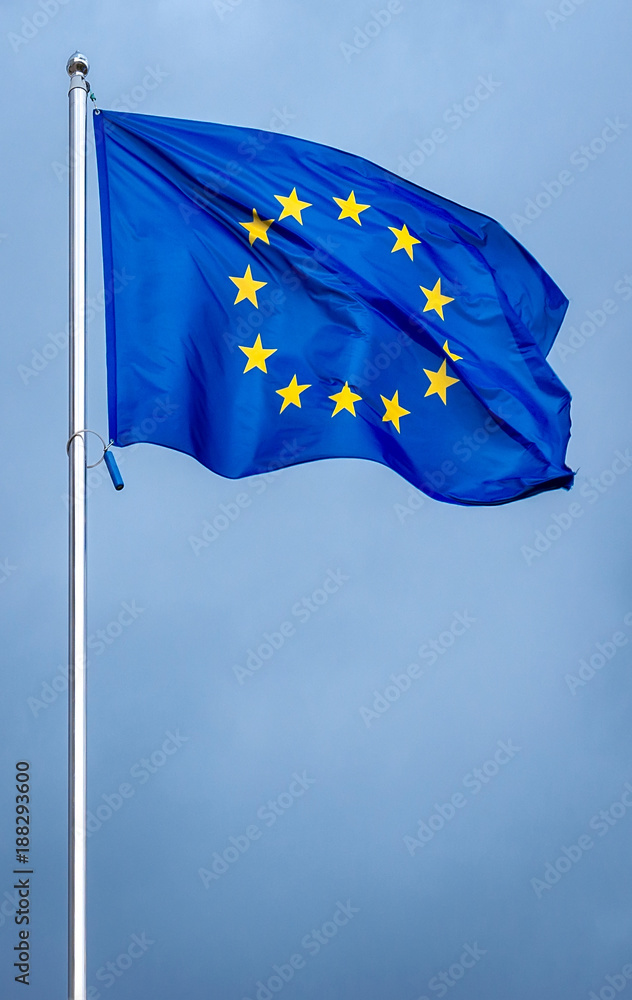 The flag of the European Union , against the background of the sunny sky. The flag of the European Union , against the background of the sunny sky.
