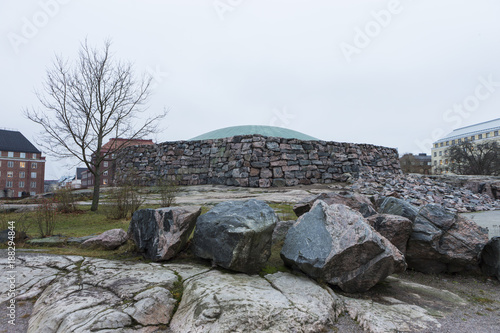 Church in the rock (Temppeliaukion Kirkko Built and Created by Timo and Tuomo Suomalainen in  1969) and Now Remaining One of The Renowned Architecture Landmarks In Finland photo