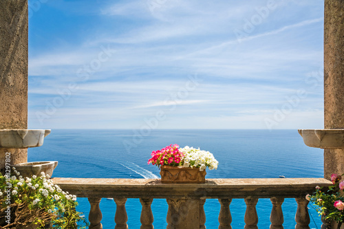 beautiful sea view in the town of Positano from antique terrace with flowers, Amalfi coast, Italy