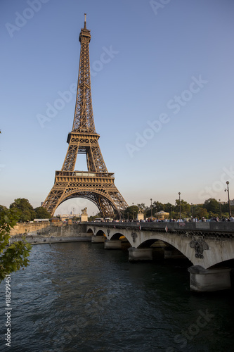 Eiffel Tower at sunset in Paris  France. Romantic travel background.