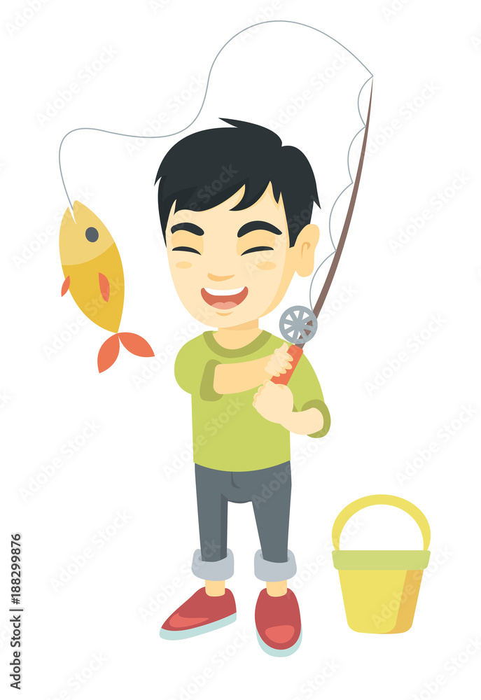 Cheerful asian little boy fishing. Smiling boy standing near the