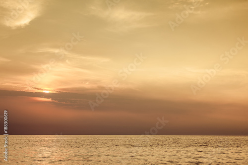 Beautiful sunset on the ocean sea © Voyagerix
