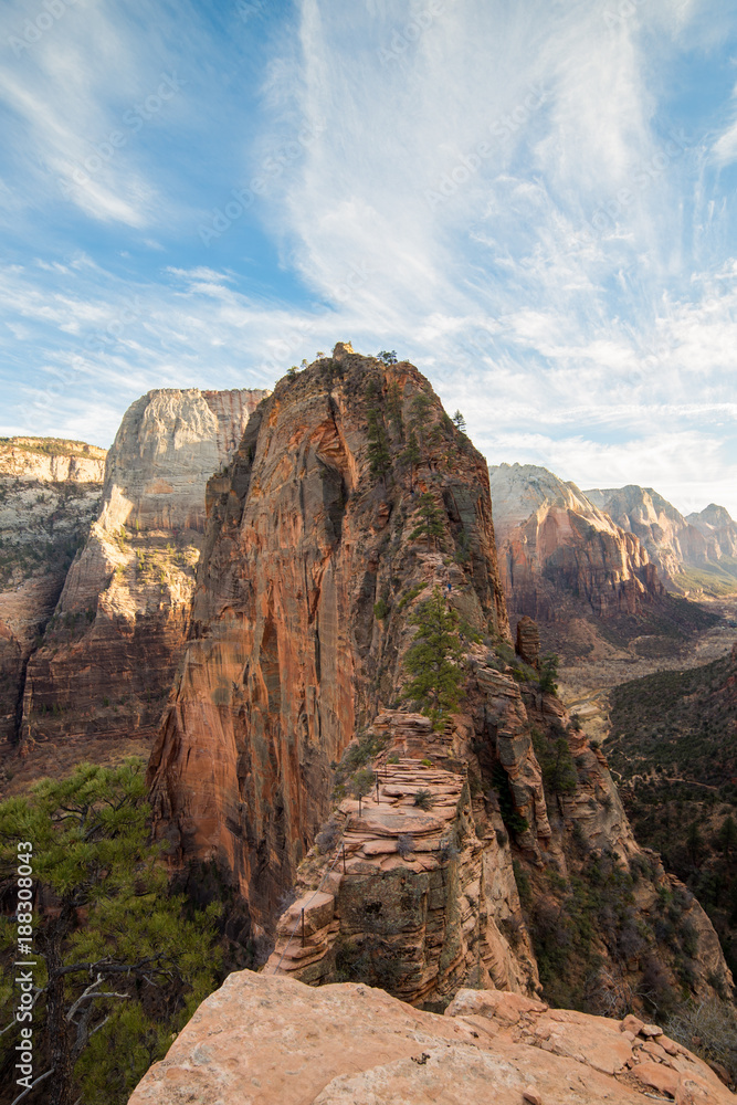 This is the picture of hikers who is hiking at Angels Landing trail at Zion National Park with mountain view. Angels Lands trail is very famous and dangerous.