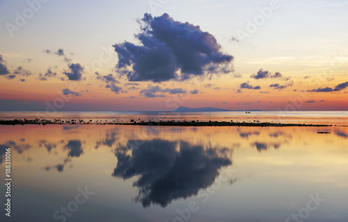Fototapeta Naklejka Na Ścianę i Meble -  Beautiful clouds reflection at sunrise in Kudat beach, Malaysia