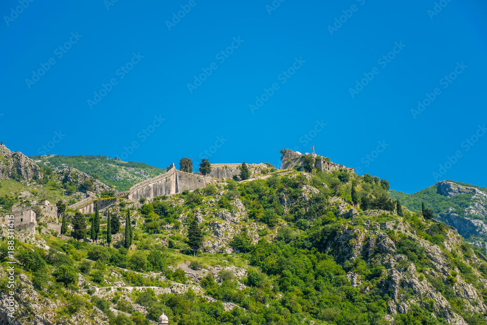 Ancient Boko-Kotor fortress is located on the slope of the mountain.
