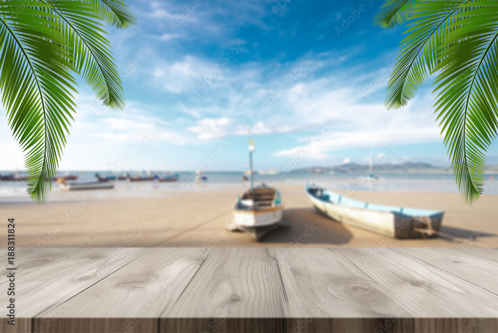 Wood table top with beach background