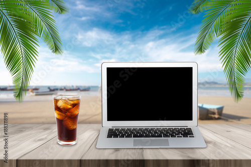 Wood table top with beach background