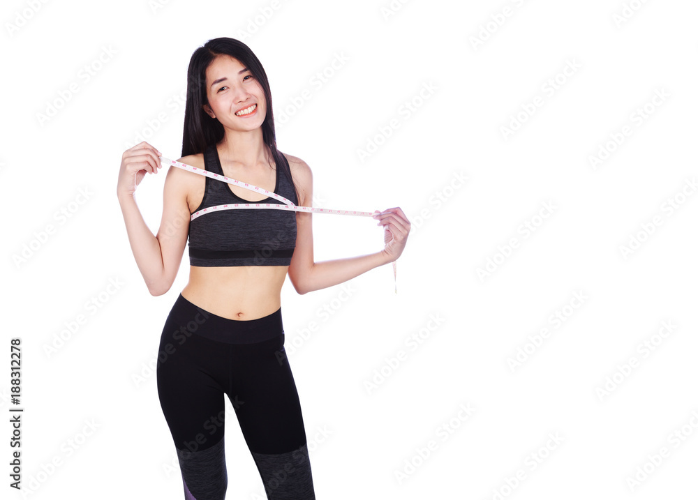 woman is measuring her chest with measure tape isolated on white background woman is measuring her chest with measure tape isolated on white background