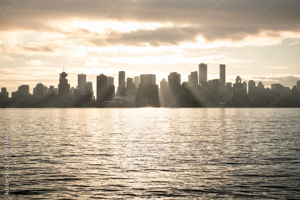 Downtown Vancouver British Columbia Canada. Sunset after the rain. Cloudy city view,