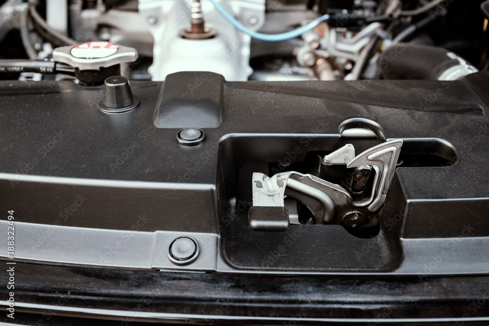 details of car engine, bonnet and hood lock system Photos | Adobe Stock