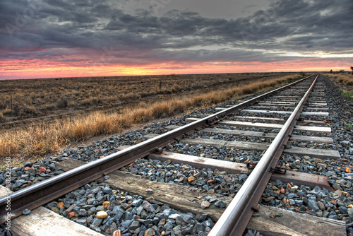 Принти на полотні railway tracks at dawn in outback Australia.