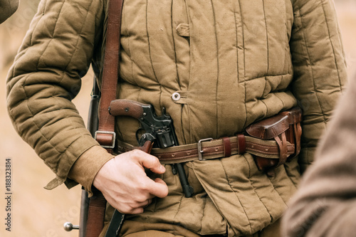 Nagan in the belt of a Soviet soldier, World War II