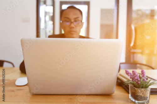 Businessman typing on laptop at workplace man working in home office hand keyboard, Hands of young people typing on laptop in the office,