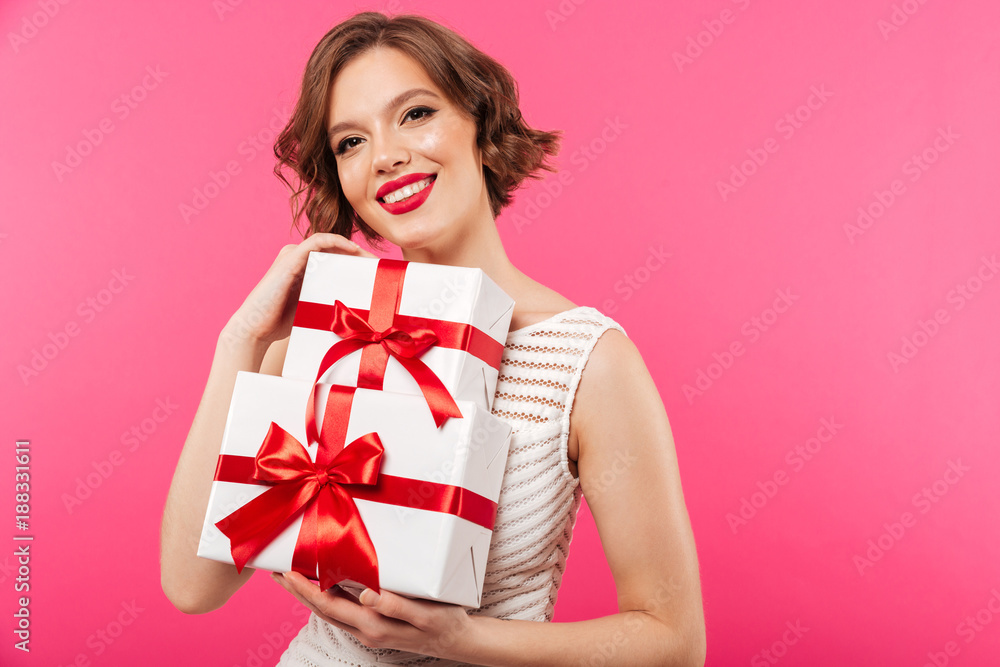 Fototapeta premium Portrait of a happy girl dressed in dress