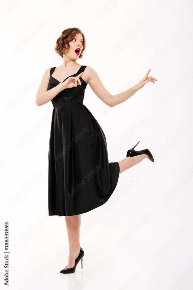Full length portrait of an excited girl Full length portrait of an excited girl